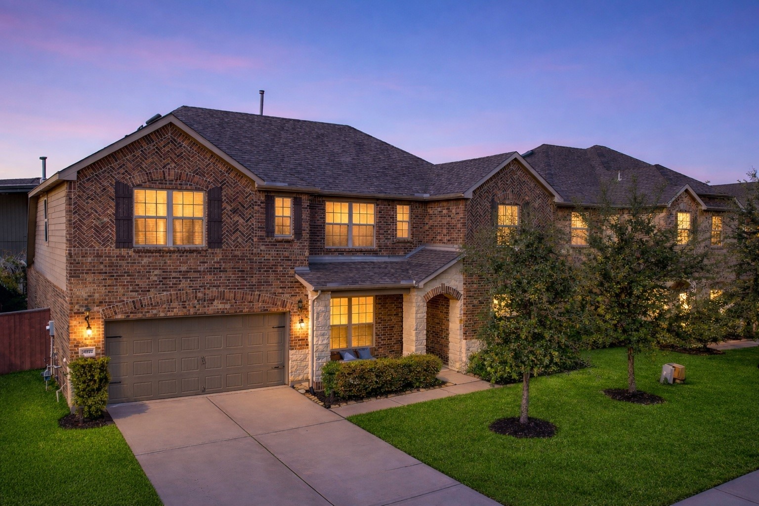 24922 Meadowthorn Crest Lane at twilight